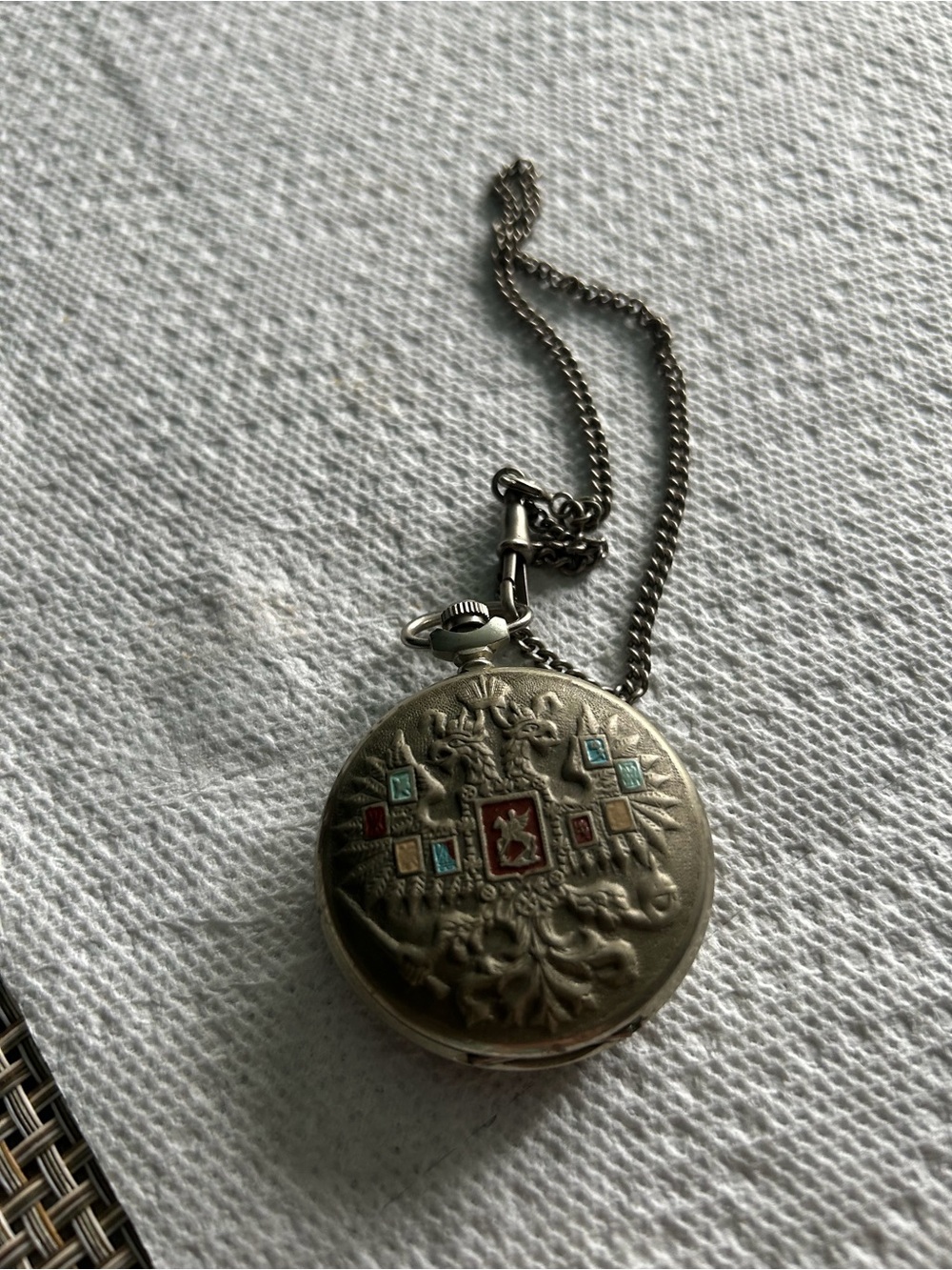 Vintage-Style Silver Pocket Watch with Turquoise and Red Accents